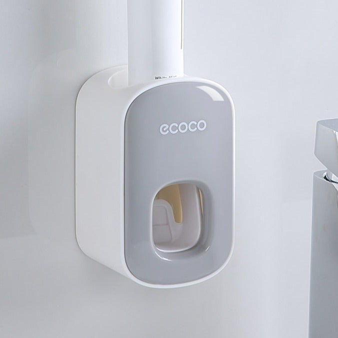 Vægmonteret automatisk tandpasta-dispenser
