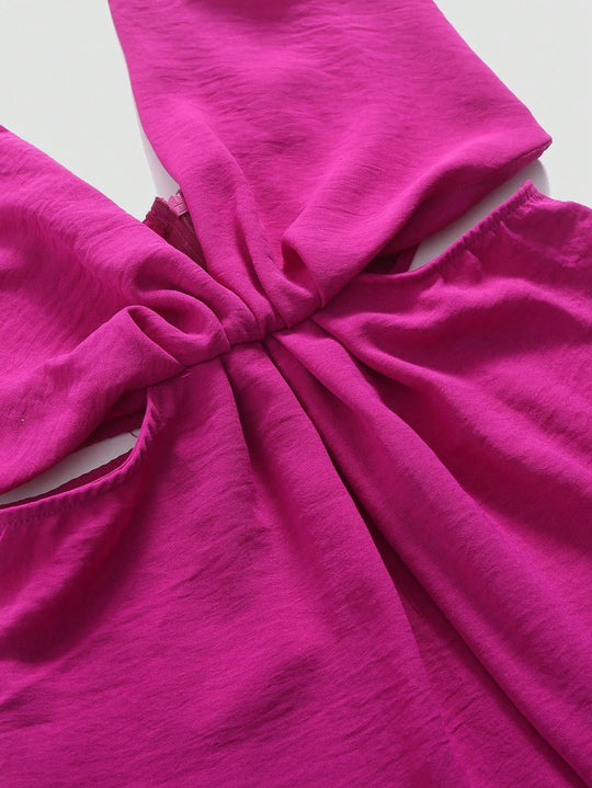 Udhulet plisseret jumpsuit med brede ben